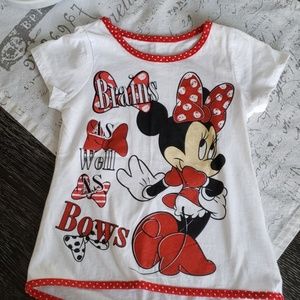 Minnie mouse shirt.